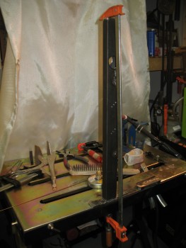 Tack welding cross bar to left side rail