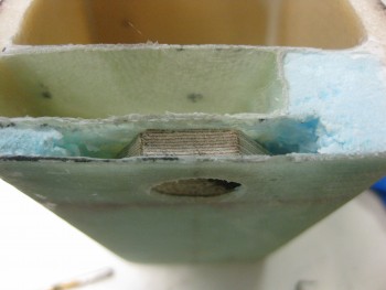 Headrest lock reinforcement plate
