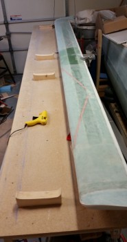 Hot gluing support blocks in place