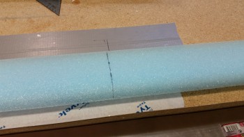 Elevator foam core marked for cut