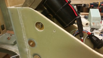 Holes drilled for mounting tabs