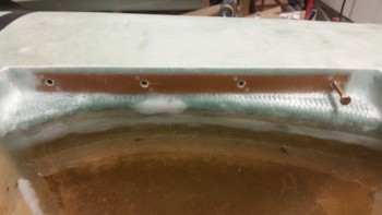 Exposed nutplate threads right side