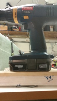 Mounting taxi lens to bracket door with silicone