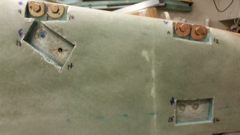 Right side upper bolt holes filled with plastic