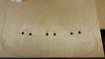 Locking tabs' side edges drilled