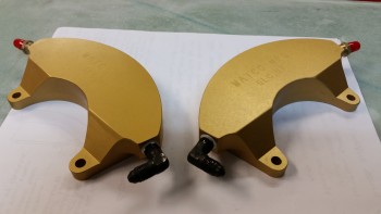 Fittings installed in brake calipers