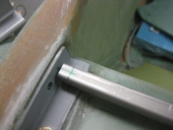 Left side GIB seat belt tube marked for drilling