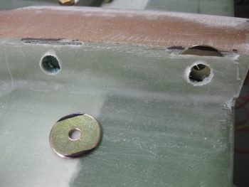 AN970-4 washer slots cut adjacent to longerons