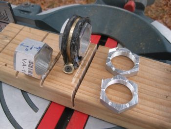 Outboard wheel pant axle nuts trimmed to 1"